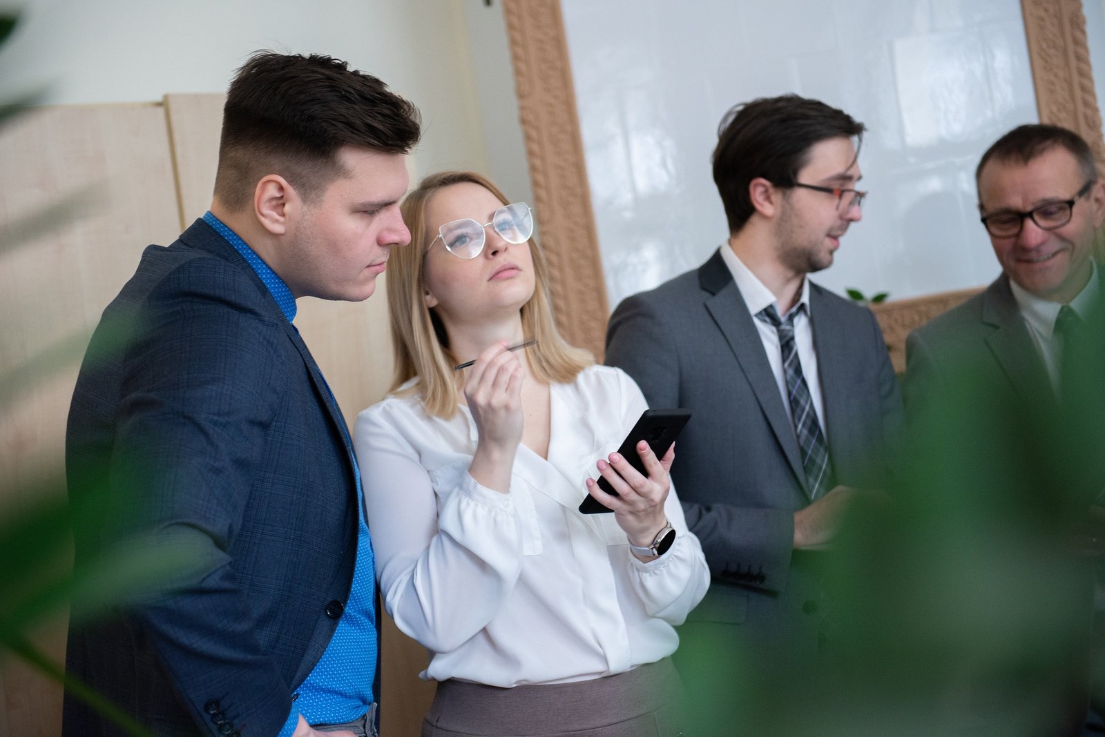 Team of caucasian bussines people debating during a work meeting. Colleagues in serious discussions